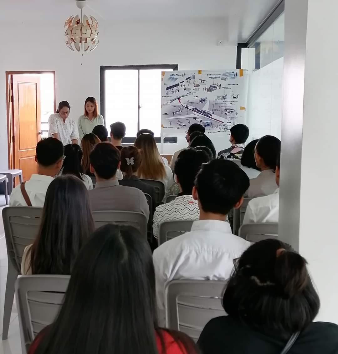 Candidates attending a pre-departure briefing