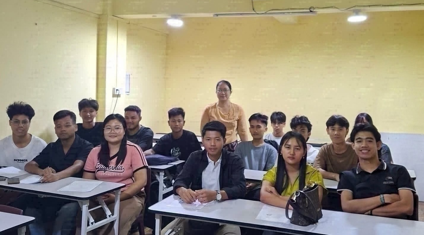 YPS students and their teacher in the classroom